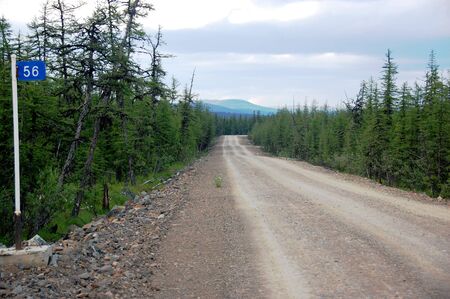 Kilometer post at taiga gravel road, Chukotka, Russiaの写真素材