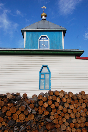 Woodpile at christian church building, Pevek town, Chukotka, Russiaの写真素材