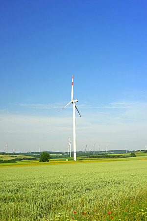 Image of a wind farm with a blue sky in the backgroundの写真素材