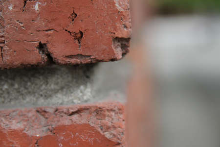 Brick wall close-up. Red brick wall texture background.の写真素材