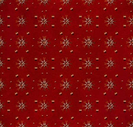 Floral and balls graphic motif pattern in red background.