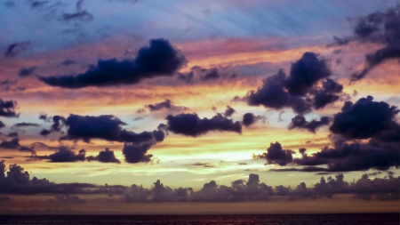 Big breathtaking clouds in a sunset summer day in Uruguay の写真素材