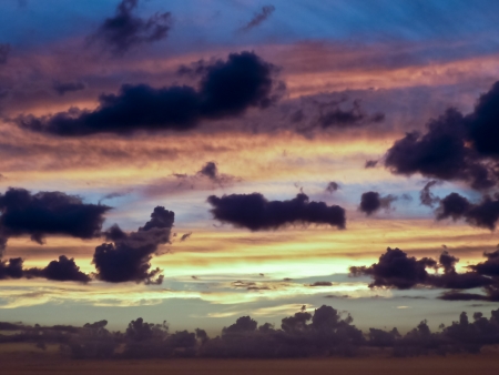 Big breathtaking clouds in a sunset summer day in Uruguay の写真素材