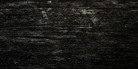 Dark damaged wood texture background in wide screen format.の写真素材