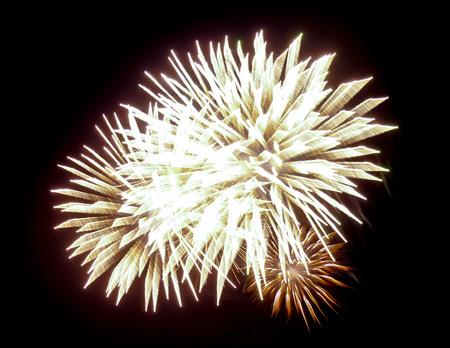 Beautiful fireworks taken in the celebration of the 2014 new year in black background.の写真素材