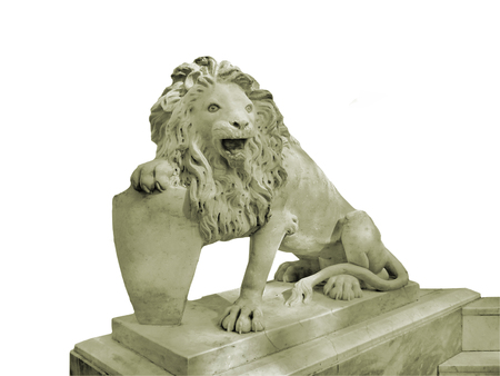 Isolated lion sculpture isolated on white の写真素材
