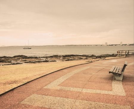 Nice and lonely view of part of the boardwalk of the famous touristic city of  Punta del Este の写真素材