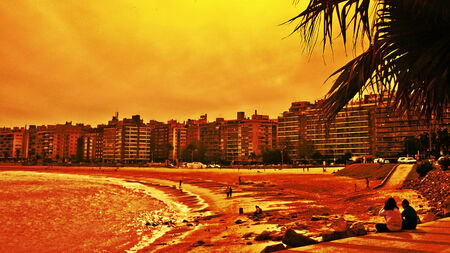 Digital photo edited of people enjoying the day in part of the boardwalk in the city of Montevideo...