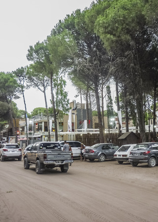 CARILO, ARGENTINA, JANUARY- 2014 - Picturesque commercial outdoor shopping stores architecture inside a beautiful park in the city of Carilo, a luxury seaside resort in the atlantic coast of Argentina.のeditorial素材