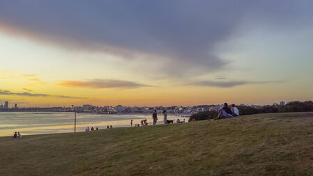 Plaza Virgilio square with a spectacular sunset landscape view of the coast of Montevideo, the capital city of Uruguay.のeditorial素材