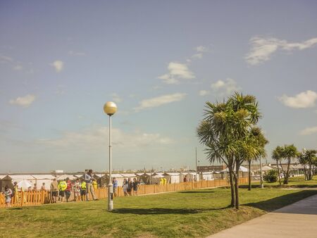 Mar del Plata, Argentina - January 2014 - People walking in the sidewalk of Mar del Plata, the most...