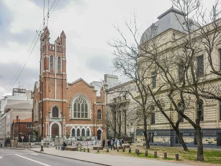 Winter day urban scene view of two traditional buildings in the city of Montevideo, the state law school and the christian scientist church.のeditorial素材