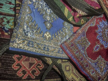 Beautiful turkish fashion accessories close up view with complex ornament decorations in colorful mixed colors.の写真素材