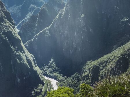 Spectacular landsacpe view of the big mountains in the ancient inca city of Machu Picchu in Cuzco, Peru.の写真素材