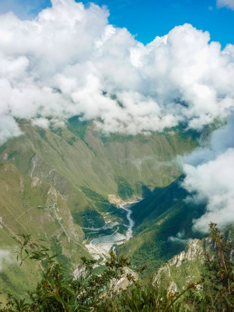 Spectacular aerial view landscape photo big mountains and river taken from Machu Picchu mountain in the ancient inca city of Machu Picchu in Cuzco, Peru.の写真素材