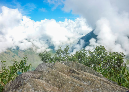 Spectacular and dangerous aerial view landscape taken from Machu Picchu mountain in the ancient inca city of Machu Picchu in Cuzco, Peru.の写真素材