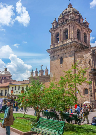 Low angle view from square of tower cathedral of Cuzco in Peru.