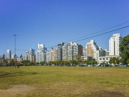 Beautiful day at park with moderns buildings at  the city of Rosario in Argentina.のeditorial素材