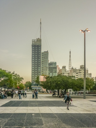 MONTEVIDEO, URUGUAY - NOVEMBER 2014 - Crowded esplanade and modern buildings in the background afternoon urban scen in the city of Montevideo, the capital of Uruguay.のeditorial素材