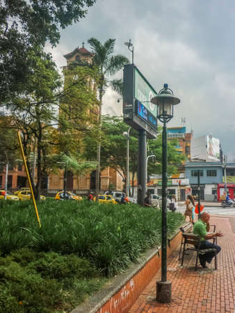 MEDELLIN, COLOMBIA, DECEMBER - 2014 - People at traditional square in El Poblado neighbourhood, one of the most exclusive places in Medellin, Colombia.のeditorial素材