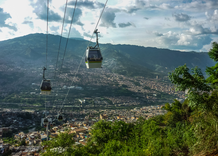 Beautiful aerial view from cableway of houses and mountains in Medellin,one of the most important cities of Colombia.の写真素材