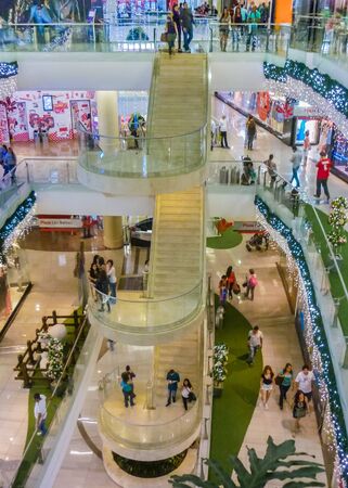 MEDELLIN, COLOMBIA, DECEMBER - 2014 - Crowded interior shooping mall scene in the city of Medellin in Colombia, South America.のeditorial素材