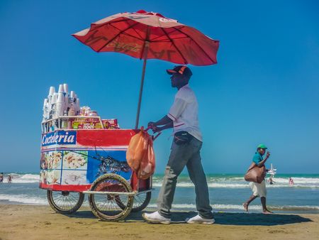 CARTAGENA, COLOMBIA, DECEMBER - 2014 - Traditional colombian vendors on the beach in Cartagena, the most famous seaside resort of Colombia, South America.のeditorial素材