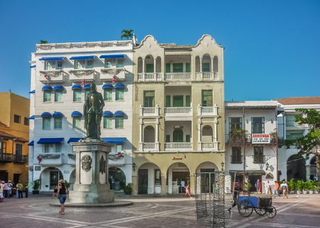 CARTAGENA, COLOMBIA, DECEMBER - 2014 - Crowded spanish colonial style square in a sunny day at Cartagena, the most famous seaside resort of Colombia, South America.のeditorial素材