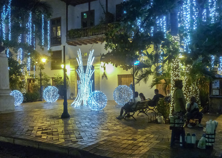 CARTAGENA, COLOMBIA, JANUARY - 2015 - Beautiful decorated small square at night in Cartagena, the most famous seaside resort of Colombia.のeditorial素材