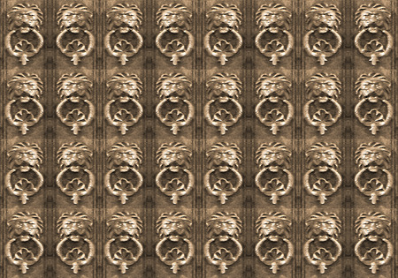 Digital art grunge textured lions ornament art motif seamless pattern in brown colors.の写真素材