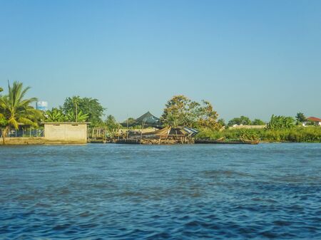 Boat view from caribbean sea of colonial style architecture of Cartagena, the most famous seaside resort of Colombia in South Americaの写真素材