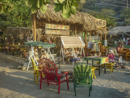 TAGANGA, COLOMBIA, JANUARY - 2015 - Traditional and picturesque bar architecture at the beach at caribbean bay called Taganga, one of the most important watering places in Colombiaのeditorial素材