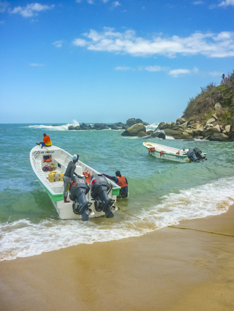 MAGDALENA, COLOMBIA, JANUARY - 2015 - Touristic small boates at Cabo San Juan beach, the most famous beach of tayrona park, a touristic protected area in the colombian northern caribbean region.のeditorial素材