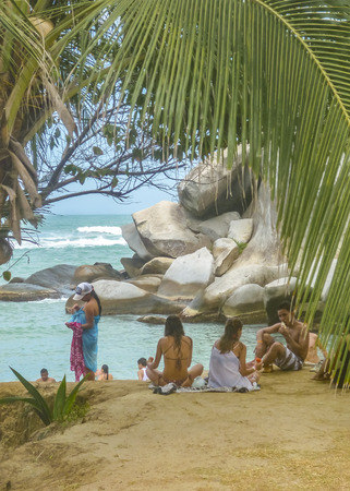 MAGDALENA, COLOMBIA, JANUARY - 2015 - Group of people at Cabo San Juan beach, the most famous beach of tayrona park, a touristic protected area in the colombian northern caribbean region.のeditorial素材