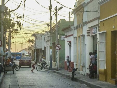SANTA MARTA, COLOMBIA, JANUARY - 2015 - Almost sunset urban scene in traditional neighbourhood of Santa Marta, one of the most important watering places of Colombiaのeditorial素材