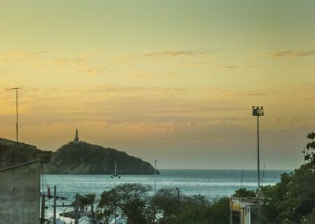Sunset scene aerial view of the coast at the caribbean sea in Santa Marta, one of the most important watering places of Colombia.の写真素材