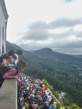BOGOTA, COLOMBIA, JANUARY - 2015 - Lot of people watching aerial view of the city of Bogota from Monserrate hill.のeditorial素材