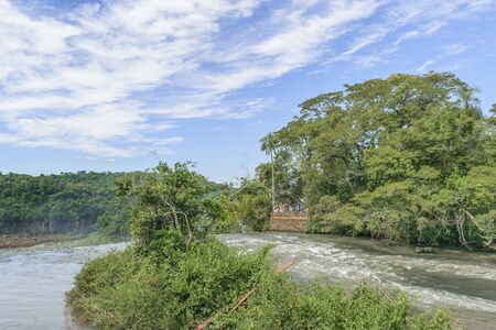 Tourists enjoying an spectacular view of Iguazu park in the argentinian border.の写真素材