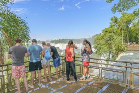 PORT IGUAZU, ARGENTINA, MARCH - 2015 - Tourists enjoying an spectacular view of Iguazu park in the argentinian border.のeditorial素材