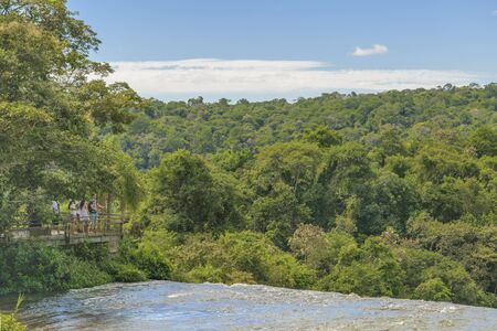 Tourists enjoying an spectacular view of Iguazu park in the argentinian border.のeditorial素材