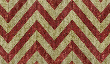 Vintage grunge chevron style seamless pattern background in red an yellow colors.