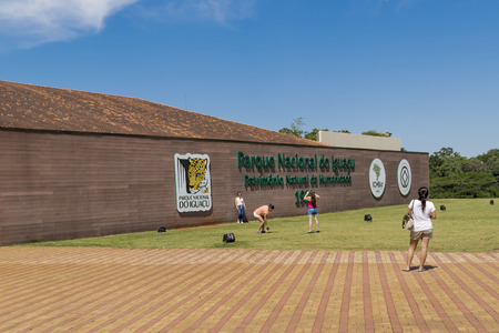 FOZ DO IGUACU, BRAZIL, MARCH - 2015 - Group of tourists taken photos of entrance building at Iguazu national park in the brazilian border.のeditorial素材