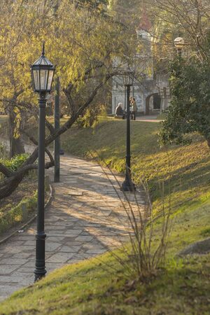 Parque Rodo park with big trees, retro lamps and stone road in the city of Montevideo, Uruguayの写真素材