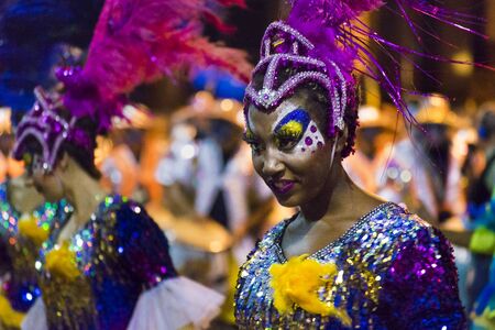 MONTEVIDEO, URUGUAY, JANUARY - 2016 - Close up view of attractive costumed black woman at inagural parade of carnival of Montevideo, Uruguayのeditorial素材