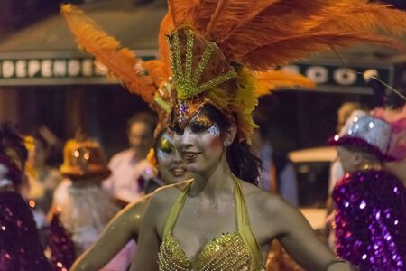 MONTEVIDEO, URUGUAY, JANUARY - 2016 - Attractive costumed woman dancing at inagural parade of carnival of Montevideo, Uruguayのeditorial素材