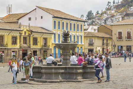 QUITO, ECUADOR, OCTOBER - 2015 - Urban day scene with lots of people at San Francisco square located in the historic center of Quito in Ecuador.のeditorial素材