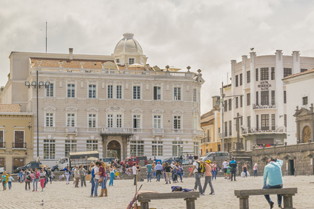 QUITO, ECUADOR, OCTOBER - 2015 - Urban day scene with lots of people at San Francisco square located in the historic center of Quito in Ecuador.のeditorial素材