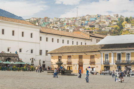 QUITO, ECUADOR, OCTOBER - 2015 - Urban day scene with lots of people at San Francisco square located in the historic center of Quito in Ecuador.のeditorial素材