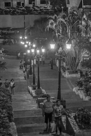 GUAYAQUIL, ECUADOR, OCTOBER - 2015 - Night urban scene of people climbing the stairs of Cerro Santa Ana, a touristic attraction of Guayaquil, Ecuador.のeditorial素材