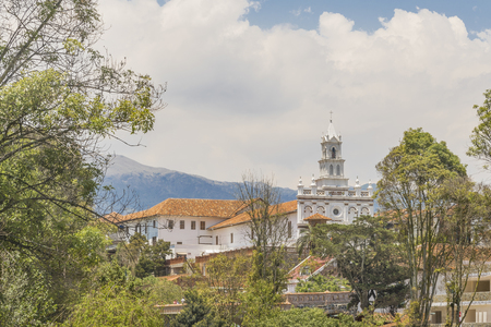 Low angle view of elegant old style eclectic buildings at Cuenca, Ecuador.の写真素材